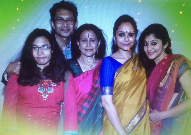 Sannidhi, Kamesh, Saroja, Rama and Dakshina in a family photograph
